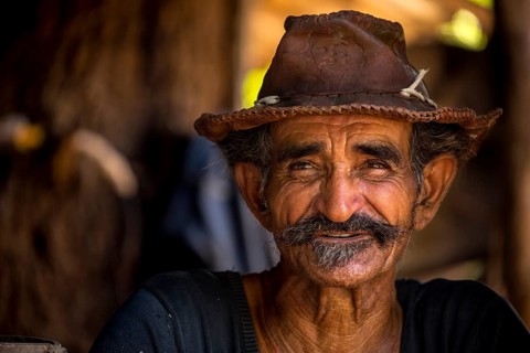 Sugar cane farmer in Valle de los Ingenios, portrait with hat, Trinidad, Cuba, Sancti Spíritus,