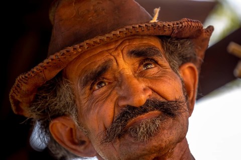 Sugar cane farmer in Valle de los Ingenios, portrait with hat, Trinidad, Cuba, Sancti Spíritus,