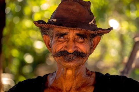 Sugar cane farmer in Valle de los Ingenios, portrait with hat, Trinidad, Cuba, Sancti Spíritus,