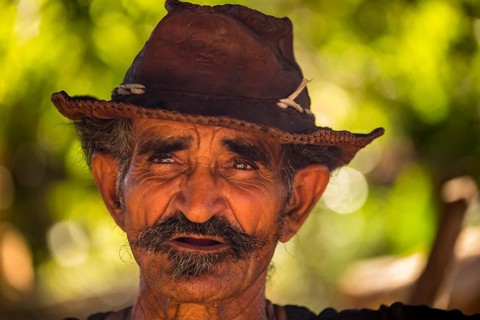 Sugar cane farmer in Valle de los Ingenios, portrait with hat, Trinidad, Cuba, Sancti Spíritus,