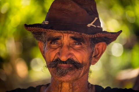 Sugar cane farmer in Valle de los Ingenios, portrait with hat, Trinidad, Cuba, Sancti Spíritus,
