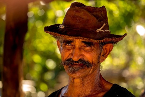 Sugar cane farmer in Valle de los Ingenios, portrait with hat, Trinidad, Cuba, Sancti Spíritus,