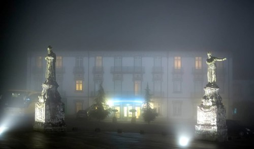 Bom Jesus do Monte Hotel next to the pilgrimage church of Braga in the evening fog, Braga, Braga
