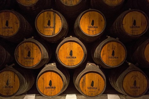 Port wine barrels, wine cellar of the Sandemann winery in Gaia, Porto, Vila Nova de Gaia, Porto