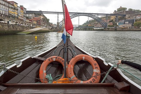 Excursion boat trip under the famous bridge of Porto, Ponte de Dom Luis I, Oporto, Porto district,