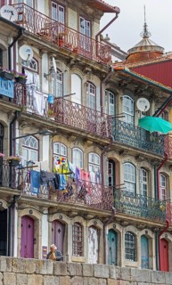 Colourful houses on the banks of the Douro in the Ribeira district, doors, Oporto, Porto district,