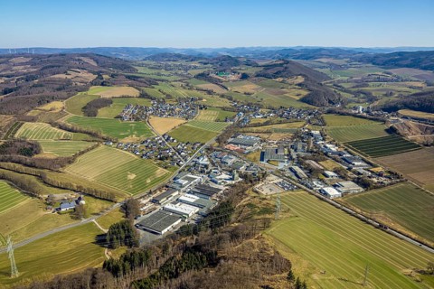 Aerial view, commercial area Am Gelben Berg, hilly landscape with wooded area, residential area