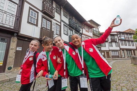 Young sportswomen in the historic centre of Guimaraes, Guimaraes, Braga district, Portugal, Europe,