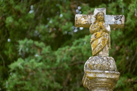 Weathered cross statue in the inner courtyard of the palace, Casa de Mateus, palace with large