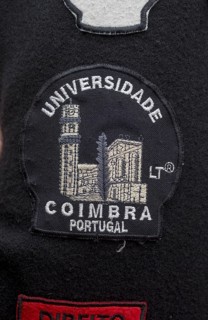 Stickers with different meanings on the capes of the students of Coimbra, University of Coimbra,