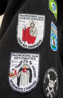 Stickers with different meanings on the capes of the students of Coimbra, University of Coimbra,