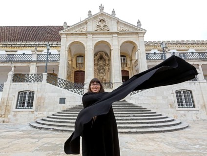 Students from the University of Comimbra explain their uniform, University of Coimbra, Coimbra,