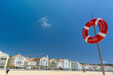 Lifebuoy on the Atlantic beach of Nazare, Nazaré, Leiria district, Portugal, Europe, Nazaré, aerial