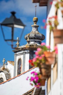 Picturesque facades with primroses and flower pots, picturesque small town Obidos, Ãbidos, district