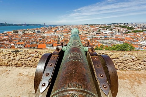 Medieval cannon, view from the Castelo de São Jorge castle to the historic centre of Lisbon,