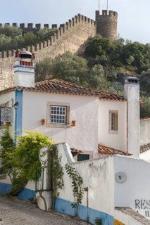 Alley with city wall, picturesque small town Obidos, Ãbidos, district Leiria, Portugal, Europe,