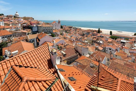 View over the red roofs of Lisbon to the Cathedral SÃ©, Lisbon, Lisbon District, Portugal, Europe,