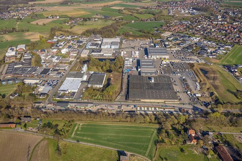 Aerial view, industrial area with construction site at the railway station at Bahnhofstraße, Bork,