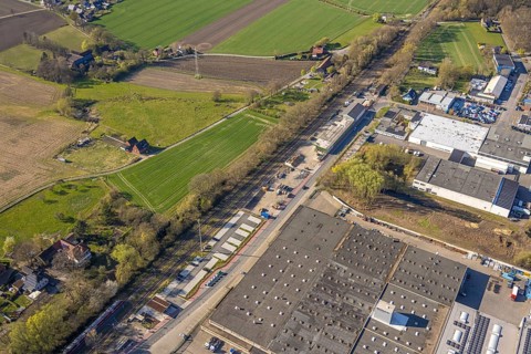 Aerial view, industrial area with construction site at the railway station at Bahnhofstraße, Bork,