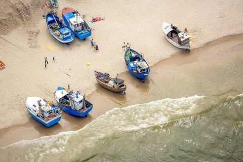 UnieÅ'cie, nest, West Pomerania, sandy beach, fishing boats, beach life, Baltic Sea coast,