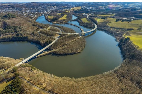 Aerial view, Biggesee with forest area, Obersee with bridge Landesstraße L512, curved bridge