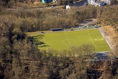 Aerial view, sports field Am Brasberg football stadium in the forest, Wengern, Wetter, Ruhr area,