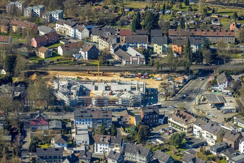 Aerial view, construction site with new building shopping centre Rewe supermarket,