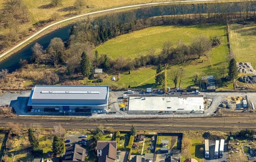 Aerial view, river Ruhr, construction site with new building on the road Zum Ostenfeld, railway