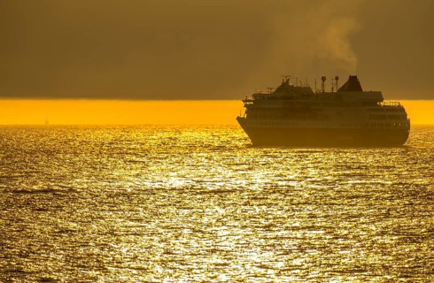 Ship MS Finnmarken, in the morning light, backlight, Berlevåg, Finnmark, Norway, Scandinavia,