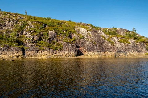 Rocky coast, cave entrance, bowøynes, Finnmark, Norway, Scandinavia, Europe, adventure trip,