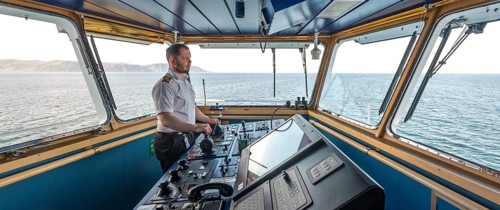 MS Polarlys, command bridge, officer on bridge, Honningsvåg, Finnmark, Norway, Scandinavia, Europe,