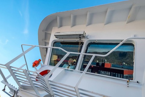 MS Polarlys, lookout of the bridge, officer on bridge, Honningsvåg, Finnmark, Norway, Scandinavia,