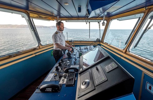 MS Polarlys, command bridge, officer on bridge, Honningsvåg, Finnmark, Norway, Scandinavia, Europe,