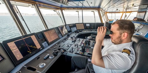 MS Polarlys, command bridge, officer on bridge, Honningsvåg, Finnmark, Norway, Scandinavia, Europe,