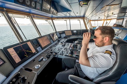 MS Polarlys, command bridge, officer on bridge, Honningsvåg, Finnmark, Norway, Scandinavia, Europe,