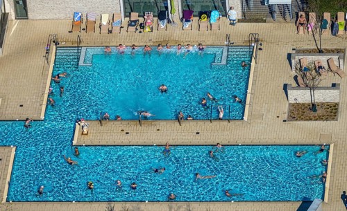 Aerial view, saltwater pool, outdoor swimming pool and bathers, sun loungers, Werne, Ruhr area,