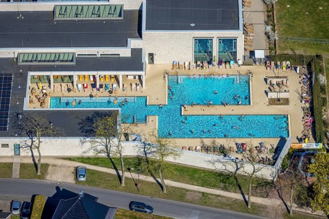 Aerial view, saltwater pool, outdoor swimming pool and bathers, sun loungers, Werne, Ruhr area,
