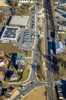 Aerial view, construction site construction work at Werl station, shopping centre with Aldi and