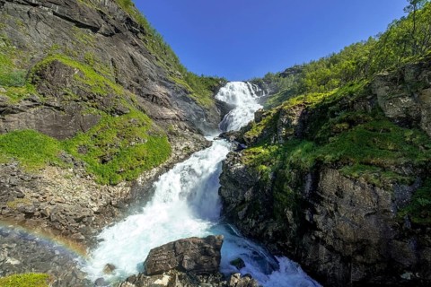 Kjosfossen waterfall, waterfall near Fureberget, rock faces, trees, sky, Flåm, Sogn og Fjordane,
