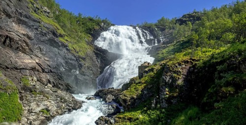 Kjosfossen waterfall, waterfall near Fureberget, rock faces, trees, sky, Flåm, Sogn og Fjordane,
