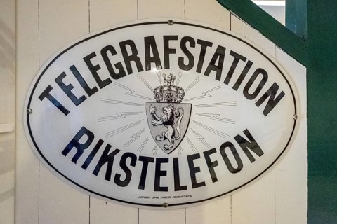 Travel by Flam Railway, Iron Railway, White sign with black lettering, TELEGRAFSTATION