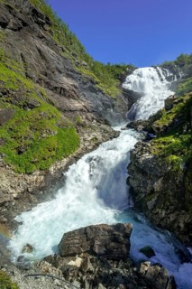Kjosfossen waterfall, waterfall near Fureberget, rock faces, trees, sky, Flåm, Sogn og Fjordane,