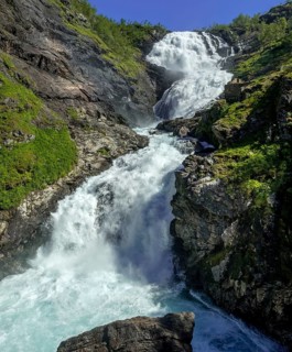 Kjosfossen waterfall, waterfall near Fureberget, rock faces, trees, sky, Flåm, Sogn og Fjordane,
