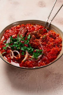 Chashushuli, a traditional Georgian dish, spicy, stewed meat with tomatoes and spices, homemade, no