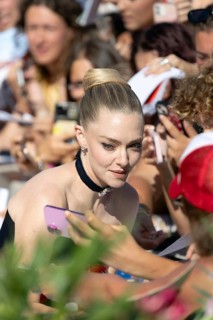 Venice, Italy - 1 September 2025: Amanda Seyfried signing autographs during the Red Carpet of - The