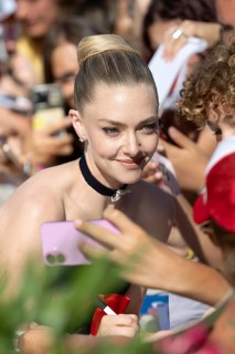 Venice, Italy - 1 September 2025: Amanda Seyfried signing autographs during the Red Carpet of - The