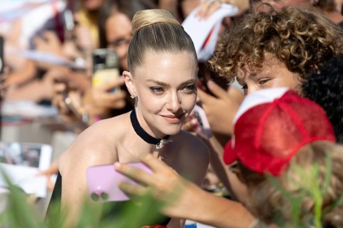 Venice, Italy - 1 September 2025: Amanda Seyfried signing autographs during the Red Carpet of - The