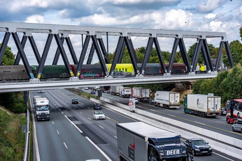The new railway bridge over the A1 motorway at the Dortmund-Unna motorway junction, steel truss