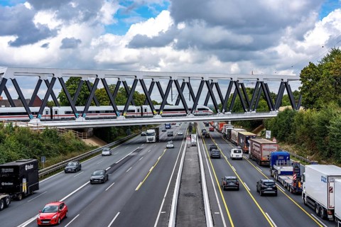 The new railway bridge over the A1 motorway at the Dortmund-Unna motorway junction, steel truss