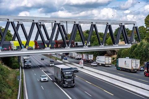 The new railway bridge over the A1 motorway at the Dortmund-Unna motorway junction, steel truss